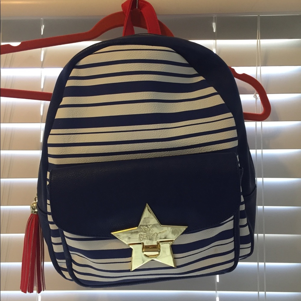 Betsey Johnson red white and blue backpack.